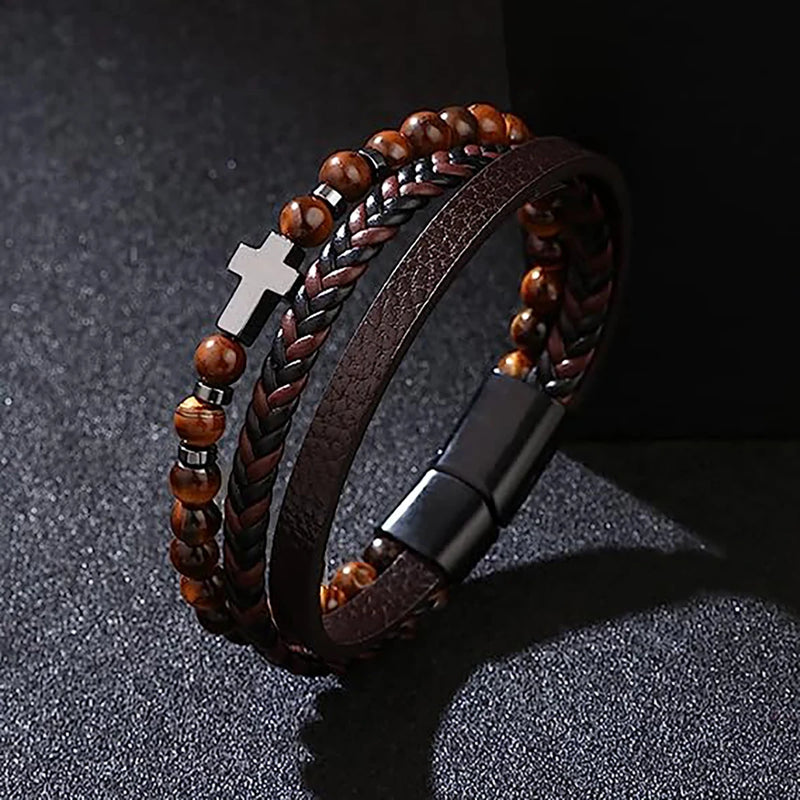 Pulseira Masculina Hermes Import em Couro Trançado com Pedra Olho de Tigre e Pingente de Cruz – Estilo Vintage